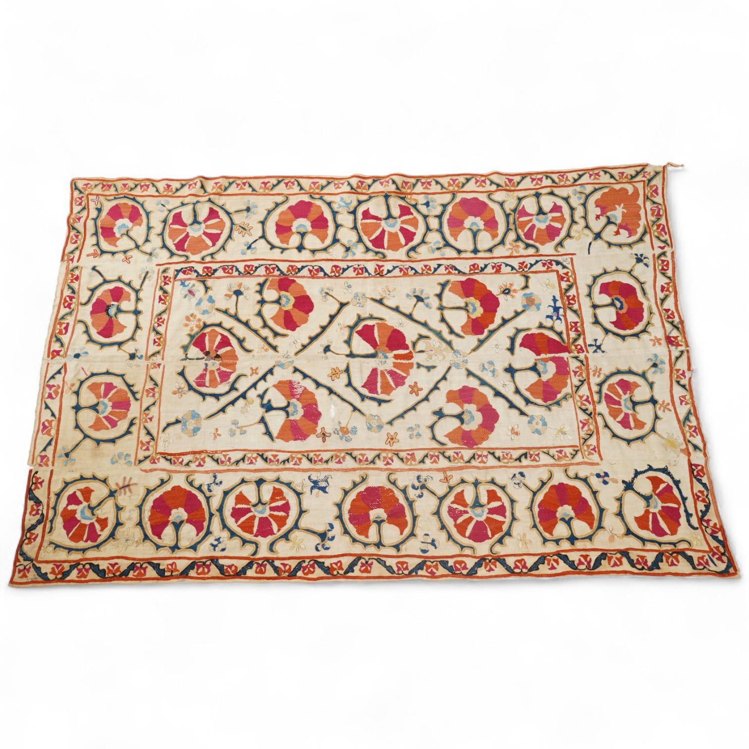 A 19th century Uzbekistan Suzani, hand embroidered hanging. Made from hand woven linen panels each approximately 28cm wide x 167cm long. Hand embroidered with silk hand dyed threads, in orange, red, blue and yellows, usi